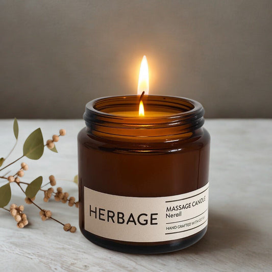 Herbage Massage Candle with a flame on a neutral background