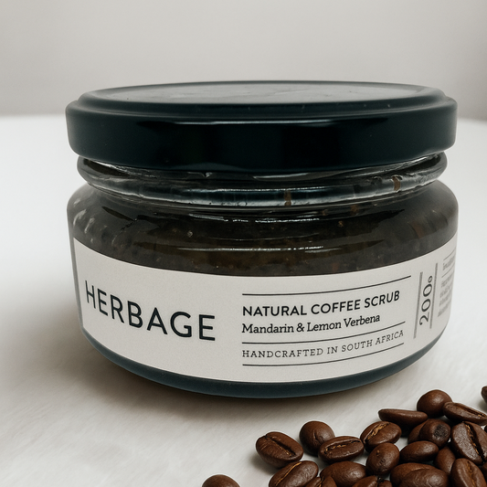 Jar of Herbage Natural Coffee Scrub with coffee beans on a white surface