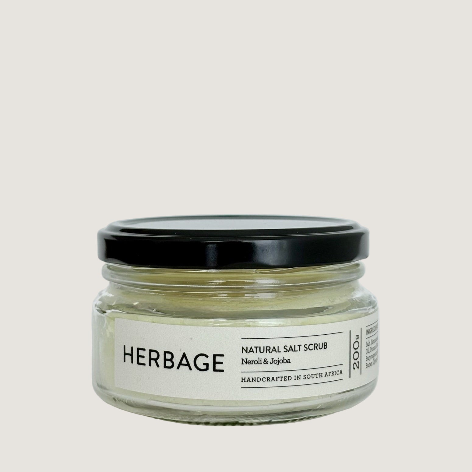 Jar of Herbage natural salt scrub on a white background